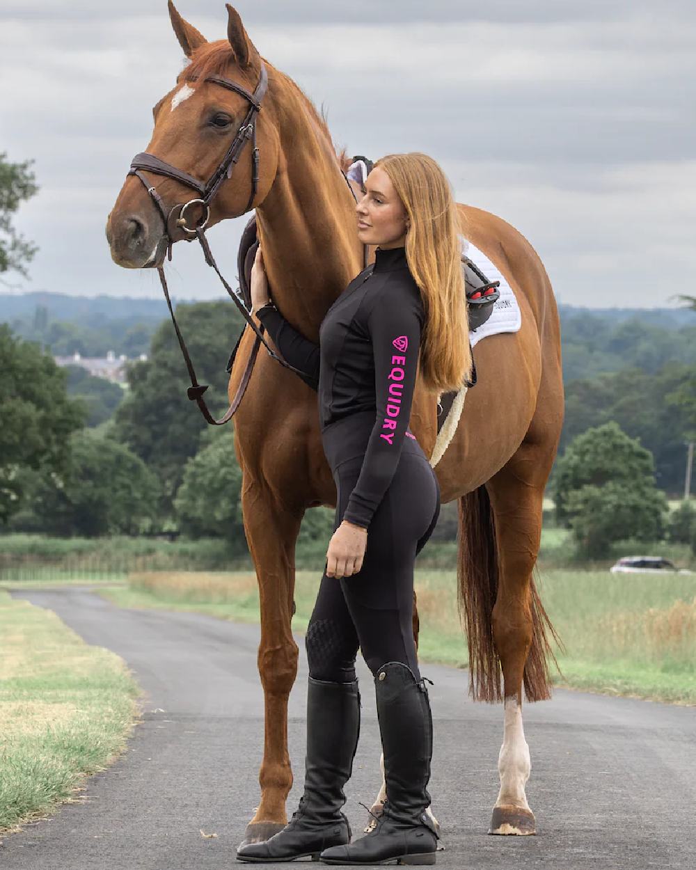 Black Peacock Pink Coloured Equidry Womens Water Repellent Base Layer on outdoor background 