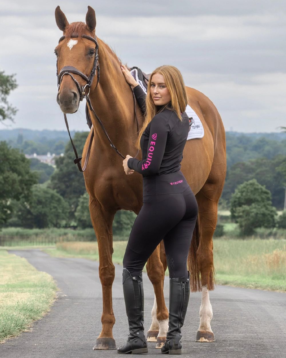 Black Peacock Pink Coloured Equidry Womens Water Repellent Base Layer on outdoor background 