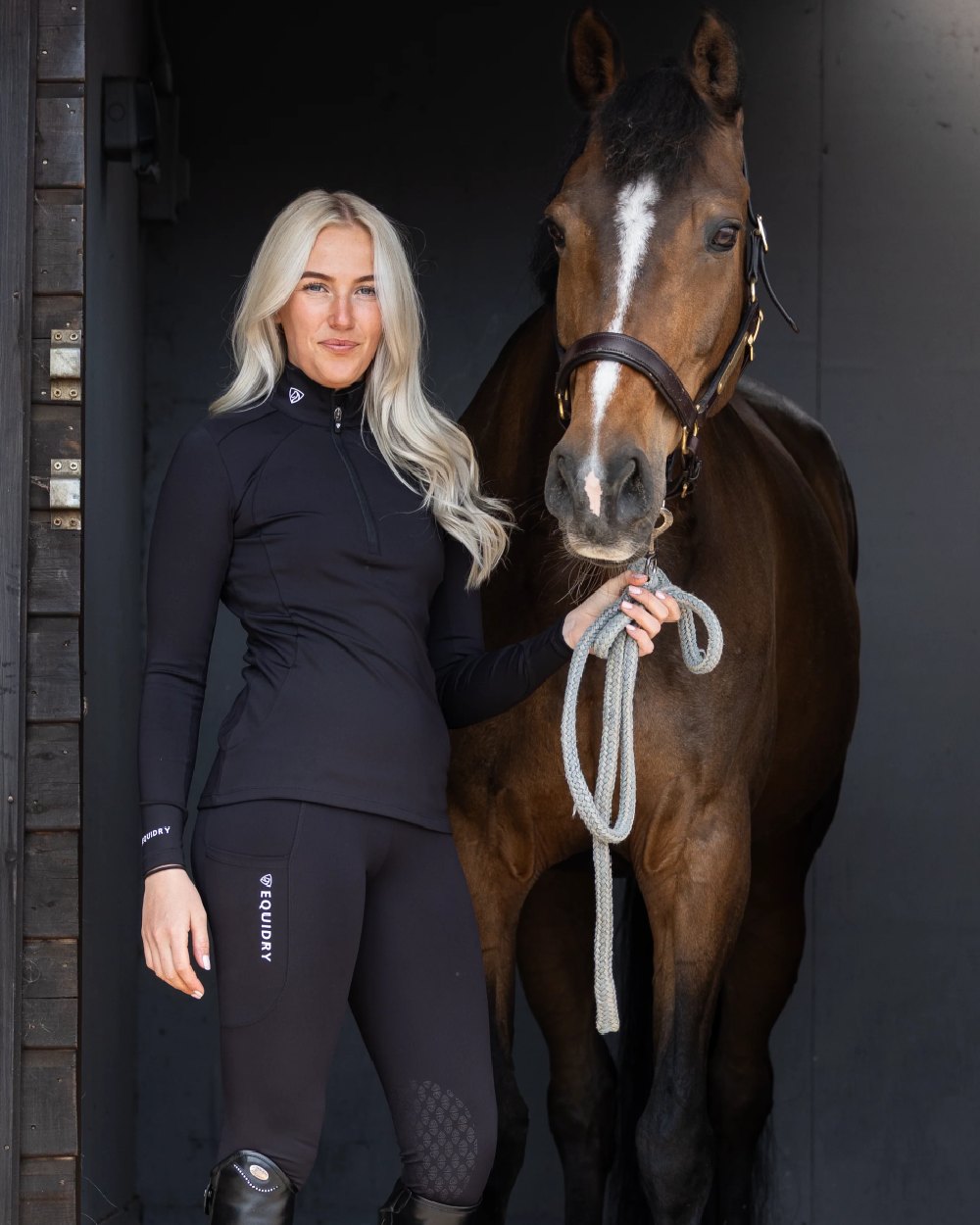 Black White Coloured Equidry Womens Water Repellent Base Layer on outdoor background 