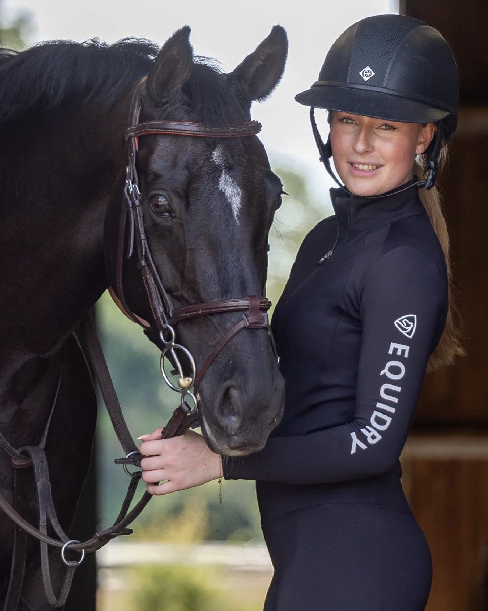 Black White Coloured Equidry Womens Water Repellent Base Layer on outdoor background 