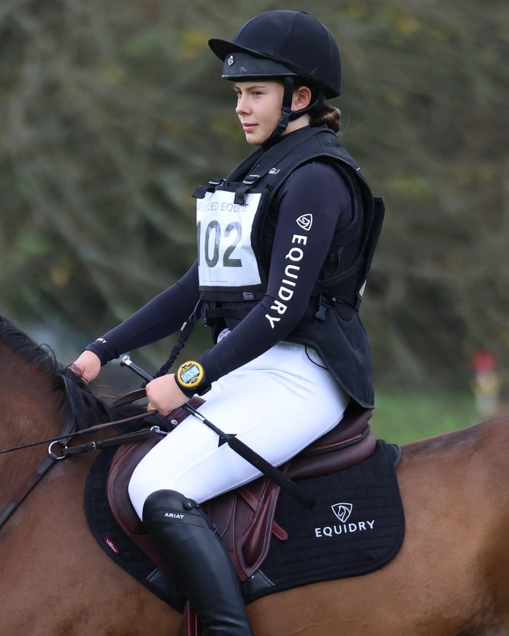 Black White Coloured Equidry Womens Water Repellent Base Layer on outdoor background 