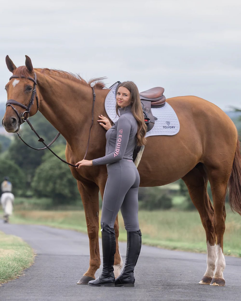 Grey Pale Pink Coloured Equidry Womens Water Repellent Base Layer on outdoor background 