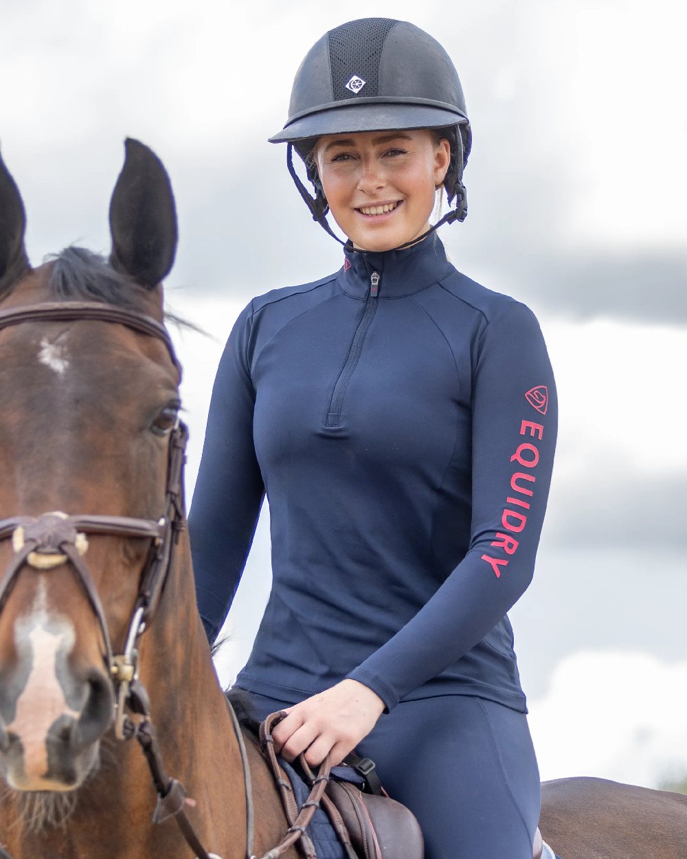 Navy Raspberry Coloured Equidry Womens Water Repellent Base Layer on outdoor background 