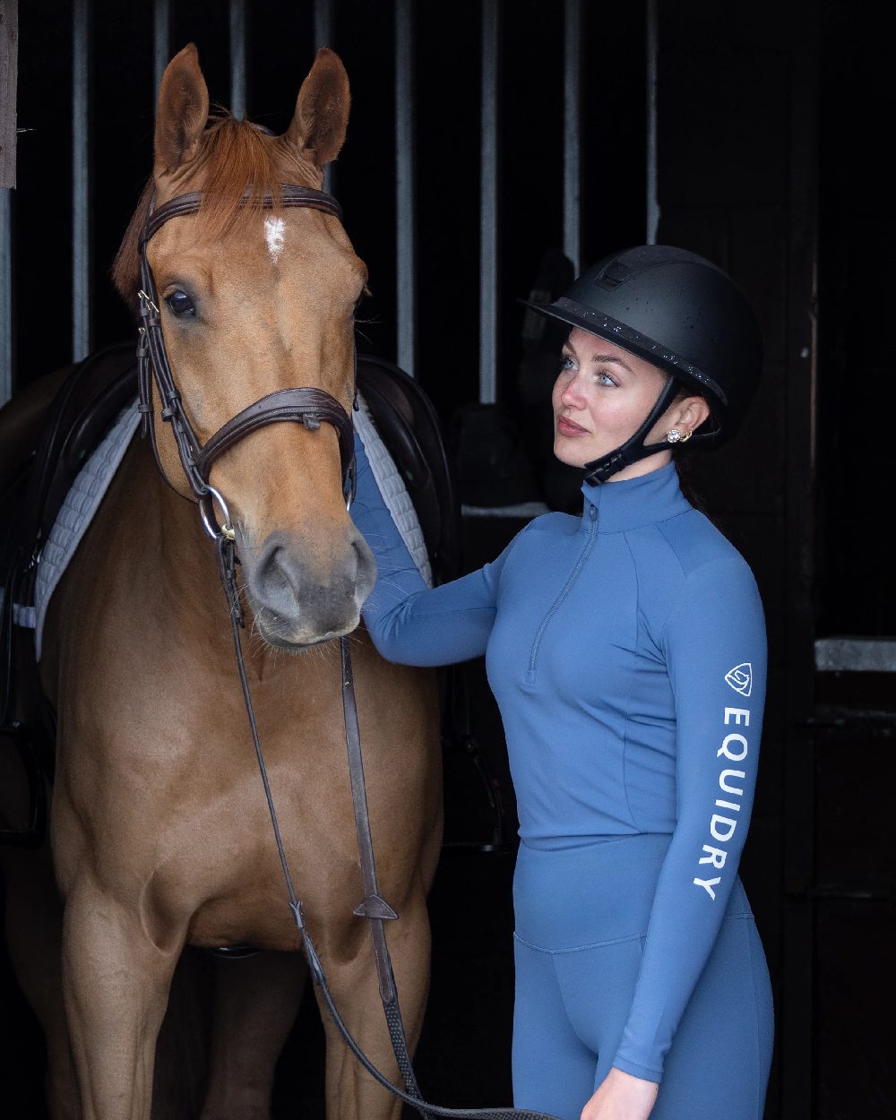 Steel Blue Grey Coloured Equidry Womens Water Repellent Base Layer on outdoor background 