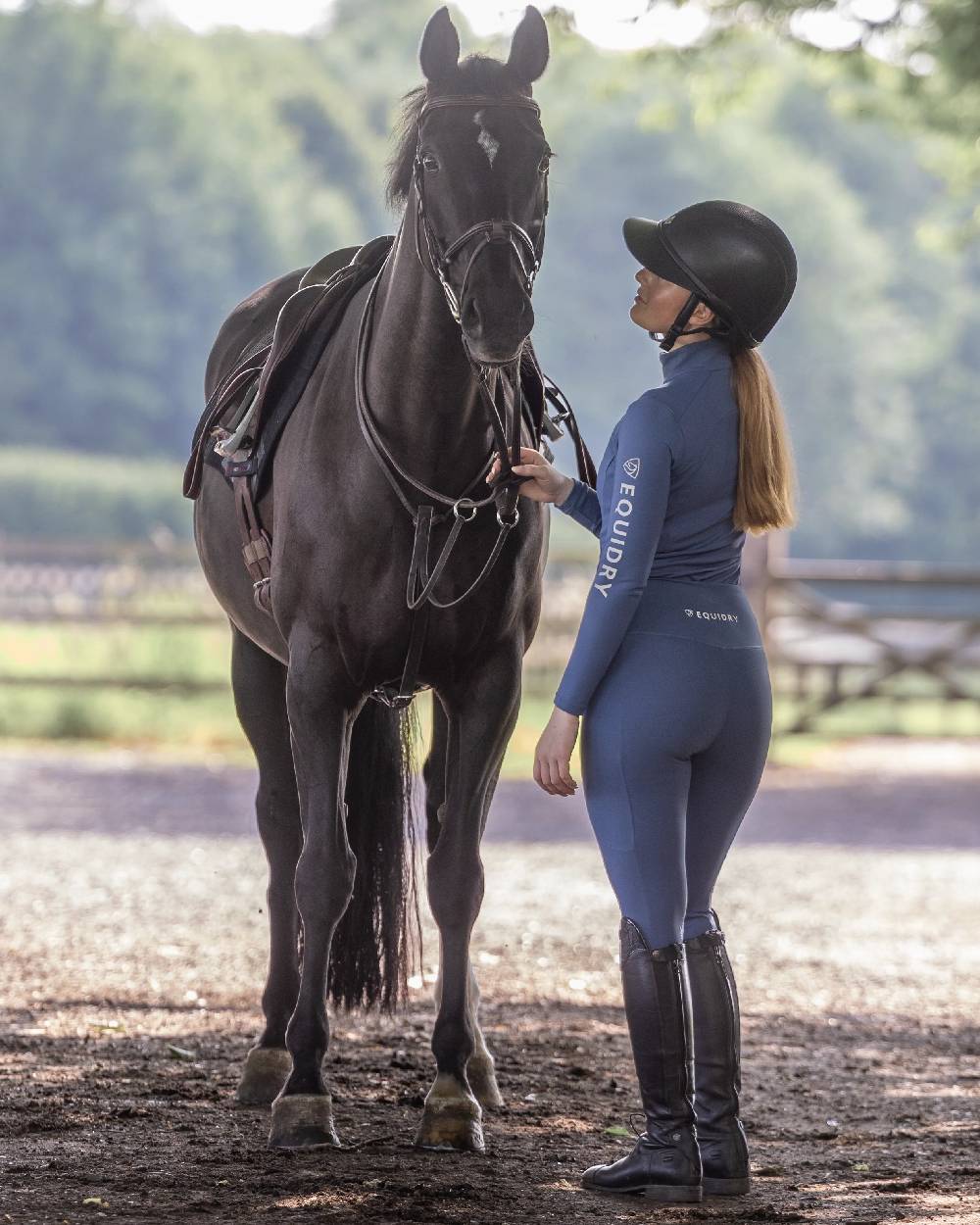 Steel Blue Grey Coloured Equidry Womens Water Repellent Base Layer on outdoor background 