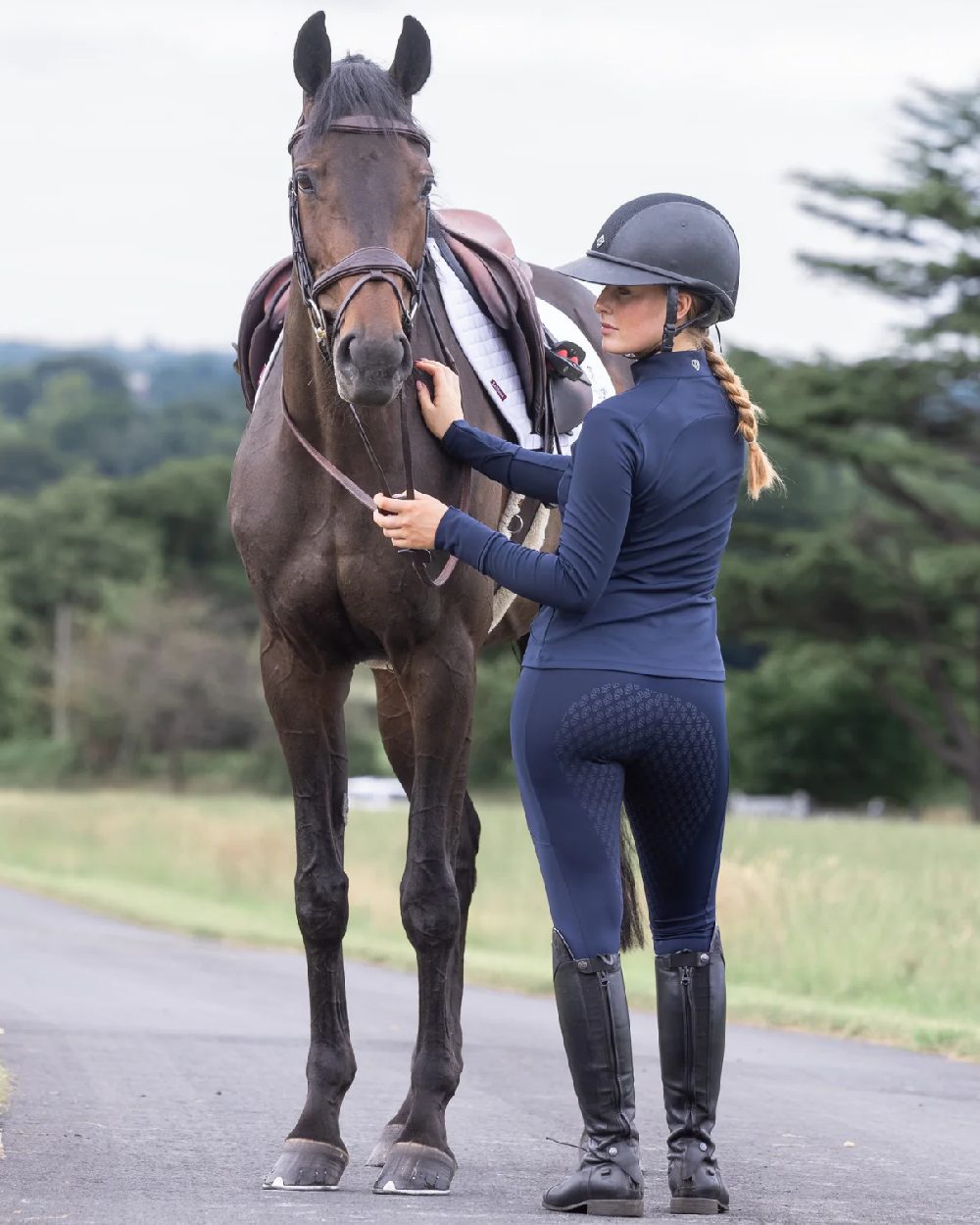 Navy Raspberry Coloured Equidry Womens Water Repellent Full Seat Leggings on outdoor background 
