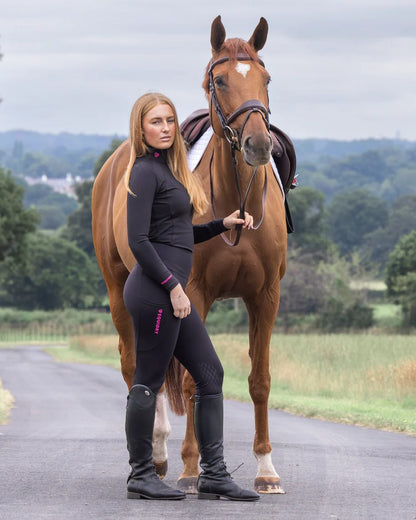 Black Peacock Pink coloured Equidry Womens Water Repellent Leggings on outdoor background 