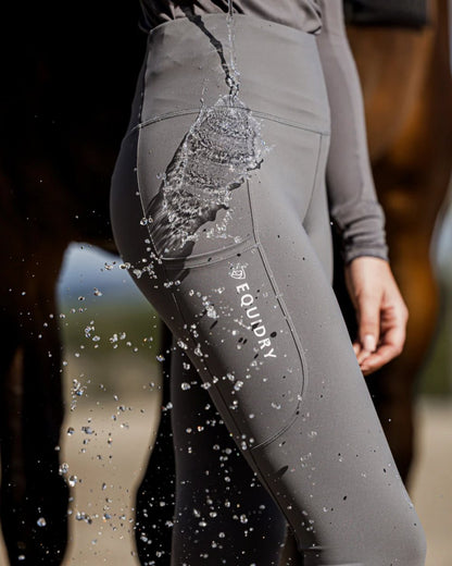 Grey White coloured Equidry Womens Water Repellent Leggings on outdoor background 