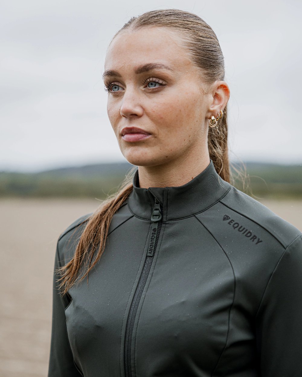 Black Forest Green Black Coloured Equidry Womens Water Repellent Zip Up Top on outdoor background 