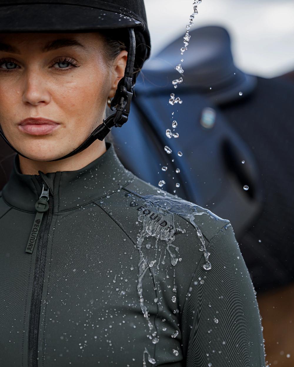 Black Forest Green Black Coloured Equidry Womens Water Repellent Zip Up Top on outdoor background 