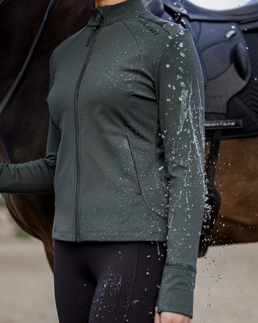 Black Forest Green Black Coloured Equidry Womens Water Repellent Zip Up Top on outdoor background 