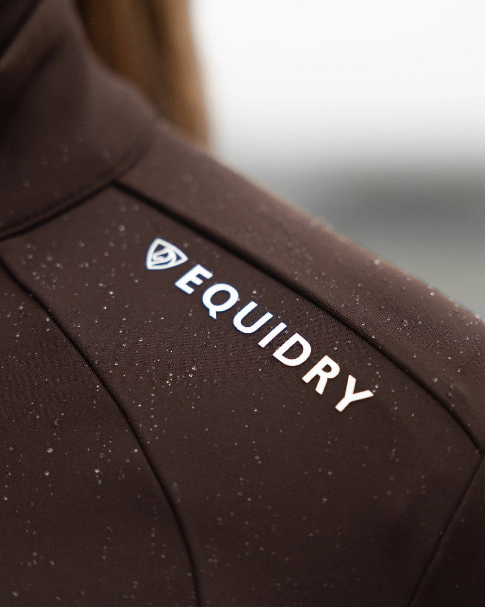 Brown White Coloured Equidry Womens Water Repellent Zip Up Top on outdoor background 