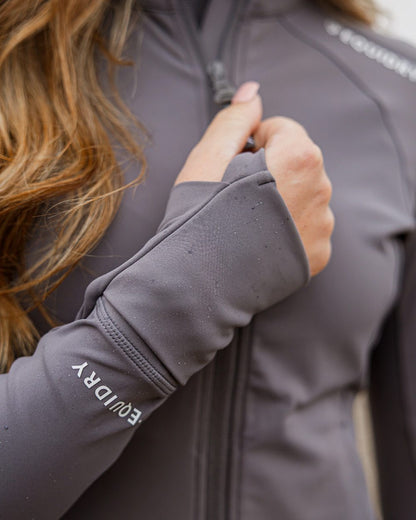 Grey White Coloured Equidry Womens Water Repellent Zip Up Top on outdoor background 