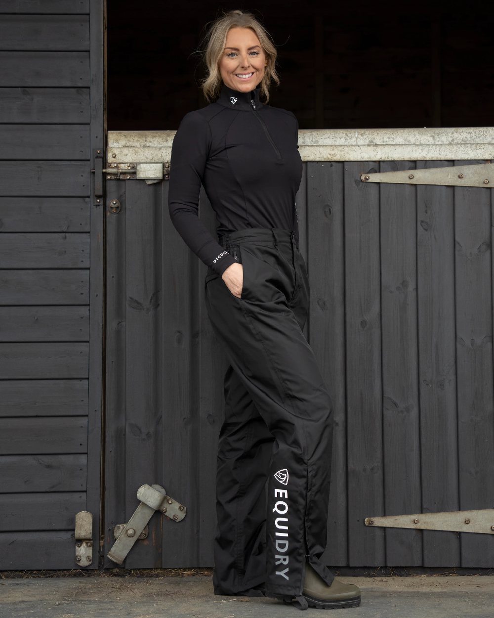 Black Coloured Equidry Womens Waterproof Fleece Lined Trousers on outdoor background 