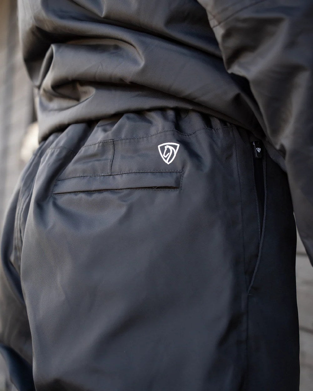 Black Coloured Equidry Womens Waterproof Fleece Lined Trousers on outdoor background 
