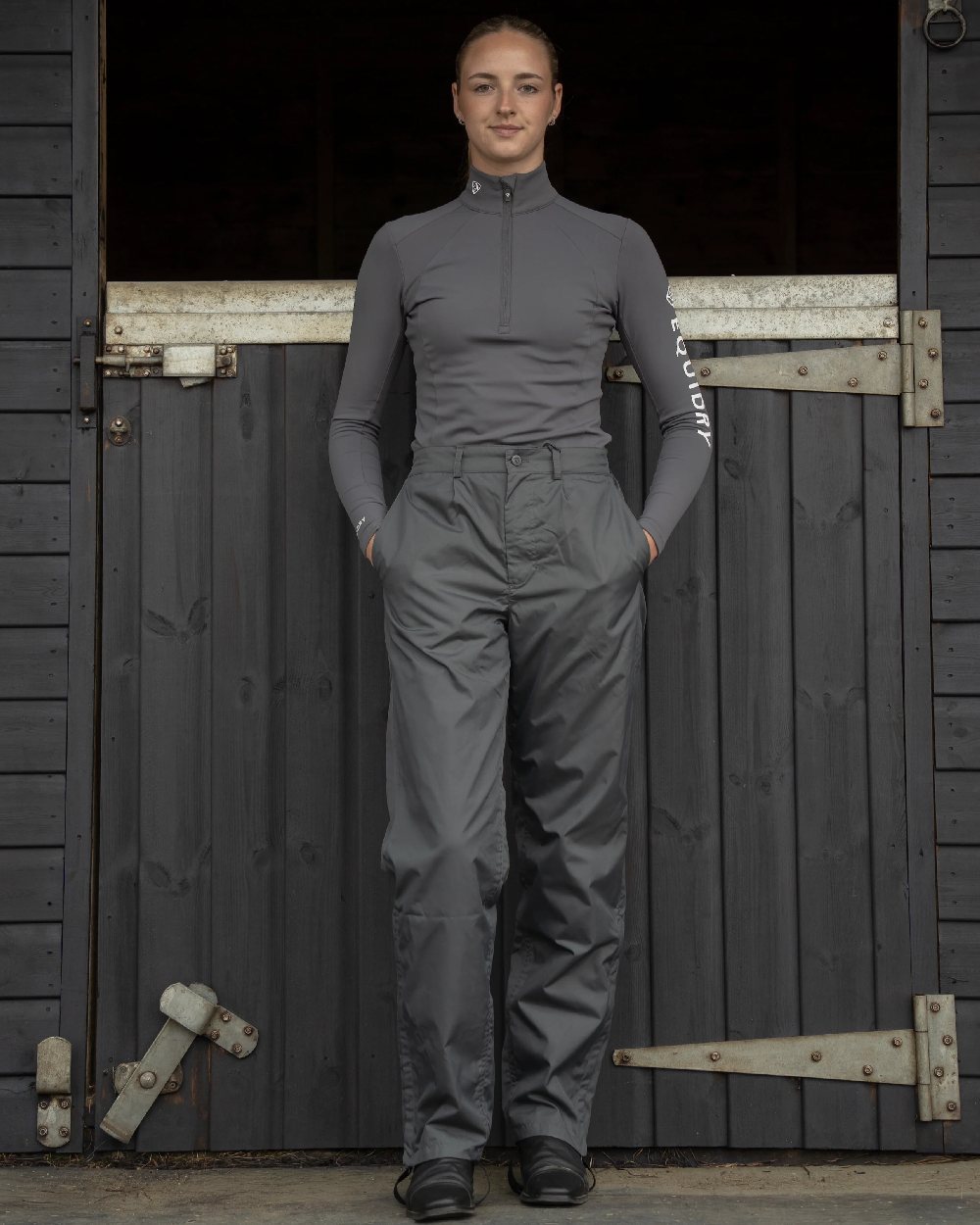 Charcoal Coloured Equidry Womens Waterproof Fleece Lined Trousers on outdoor background 
