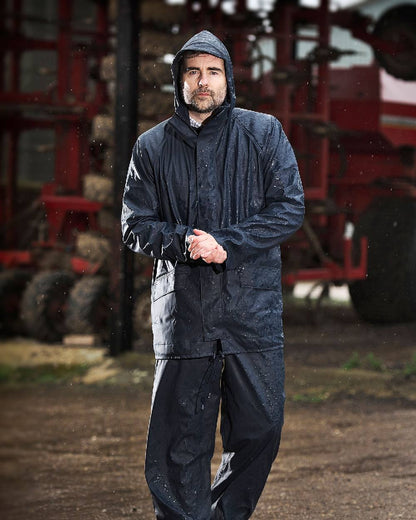 Navy coloured Fort Airflex Fortex Breathable Waterproof Jacket on blurry background 