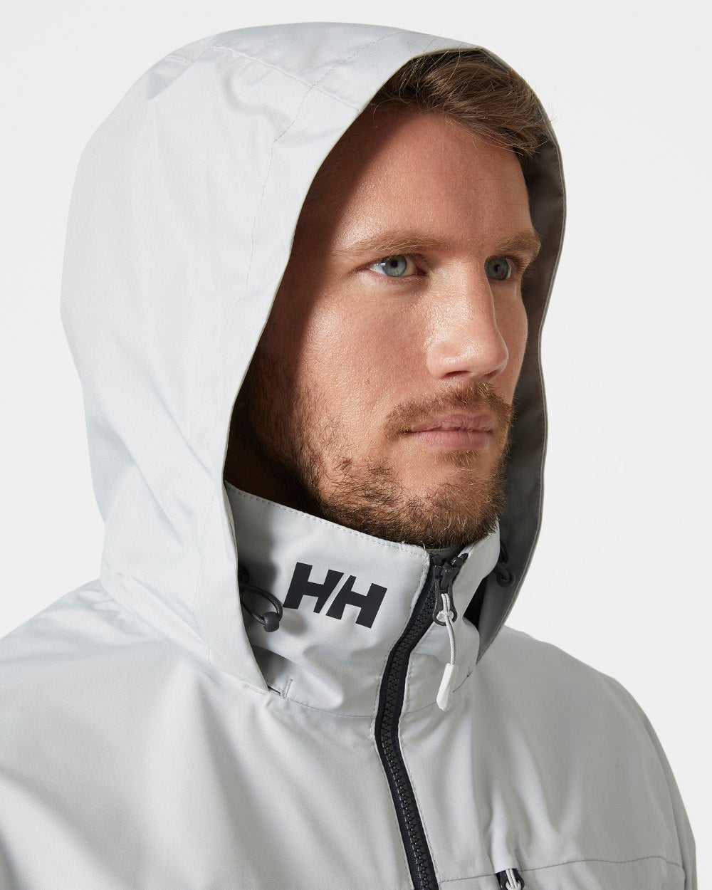 Grey Fog coloured Helly Hansen Mens Crew Hooded Jacket 2.0 on grey background 