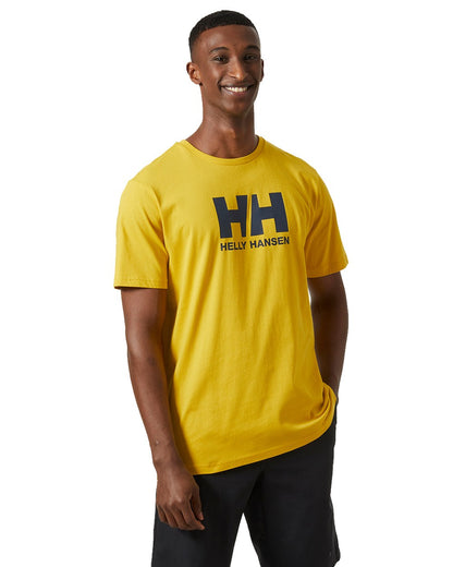 Gold Rush Coloured Helly Hansen Mens Logo T-Shirt On A White Background 