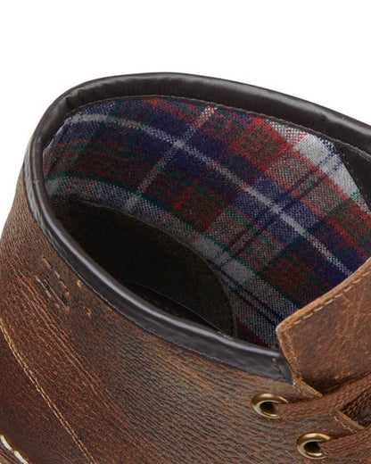 Waxy Brown coloured Grafters Heritage Monkey Boots on white background 