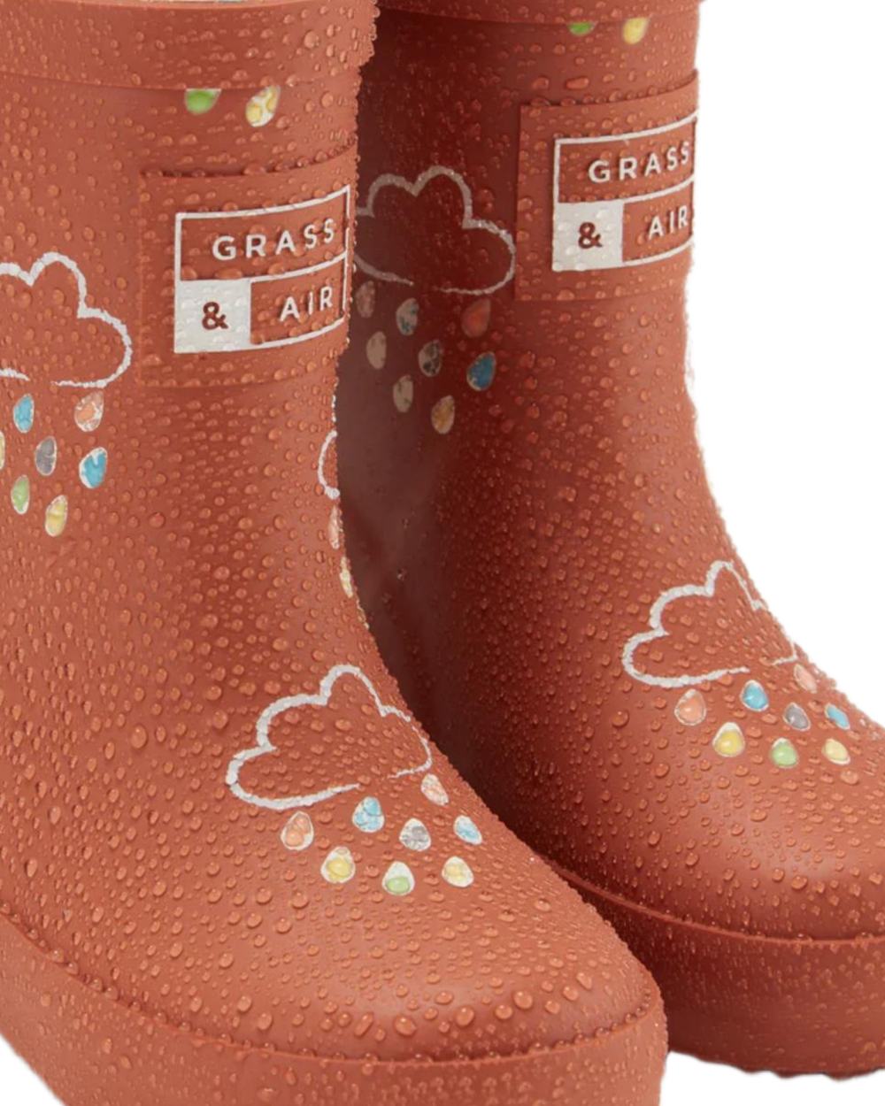 Burnt Orange coloured Grass &amp; Air Childrens Colour-Changing Wellies on white background 