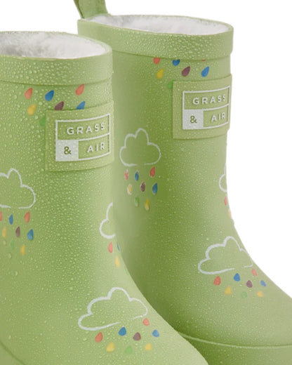 Glacial Green coloured Grass &amp; Air Childrens Colour-Changing Wellies on white background 