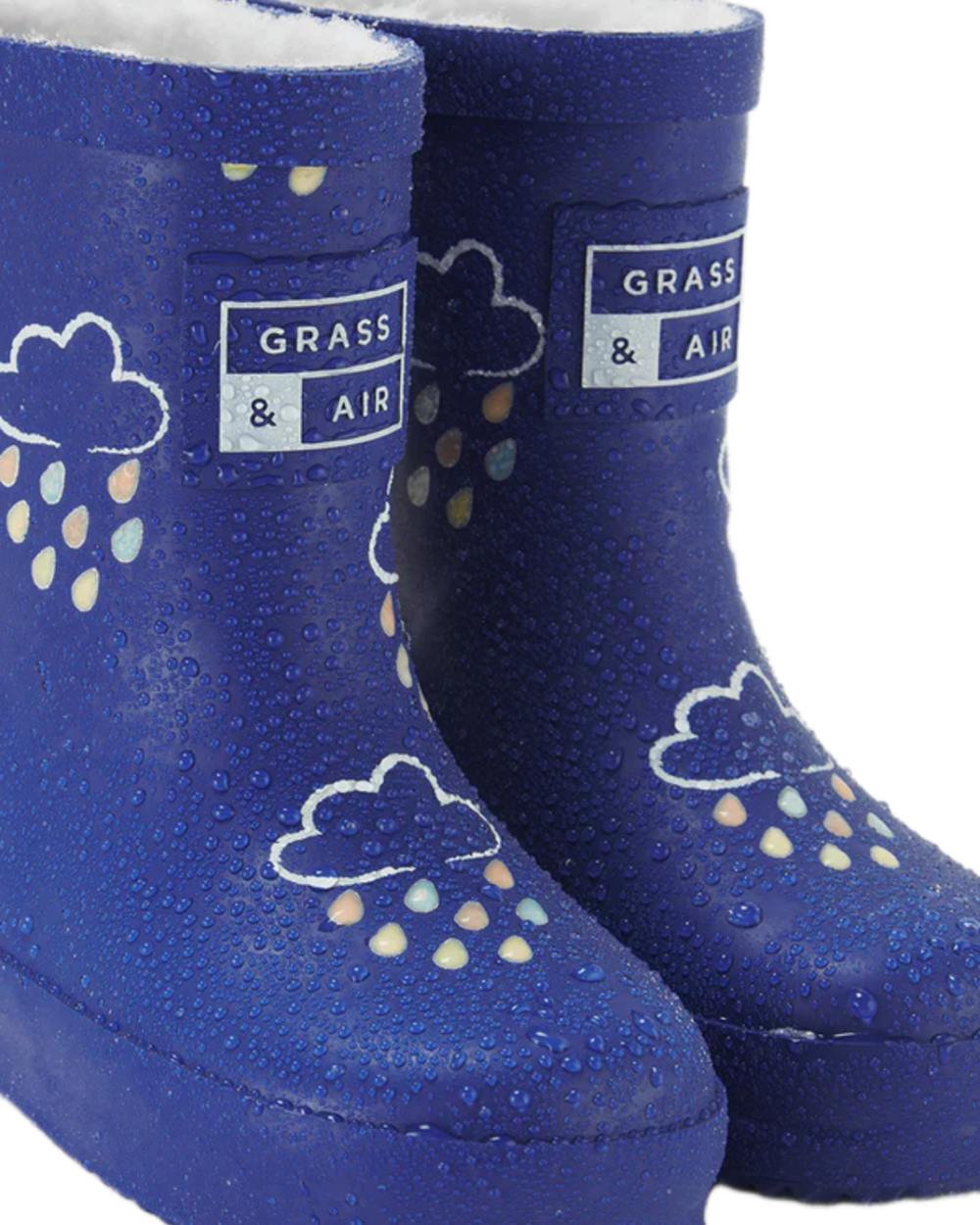 Inky Blue coloured Grass &amp; Air Childrens Colour-Changing Wellies on white background 