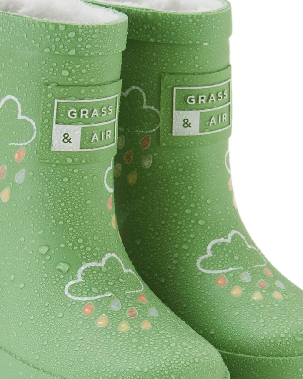 Olive Green coloured Grass &amp; Air Childrens Colour-Changing Wellies on white background 