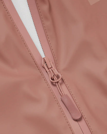 Rose coloured Grass &amp; Air Childrens Puddle Suit on white background 