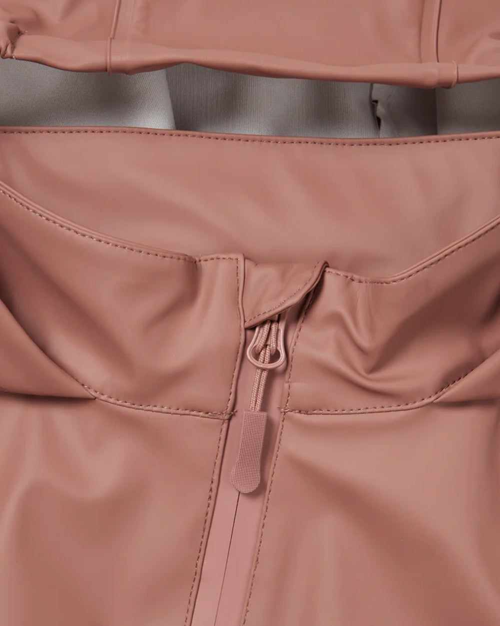 Rose coloured Grass &amp; Air Childrens Puddle Suit on white background 