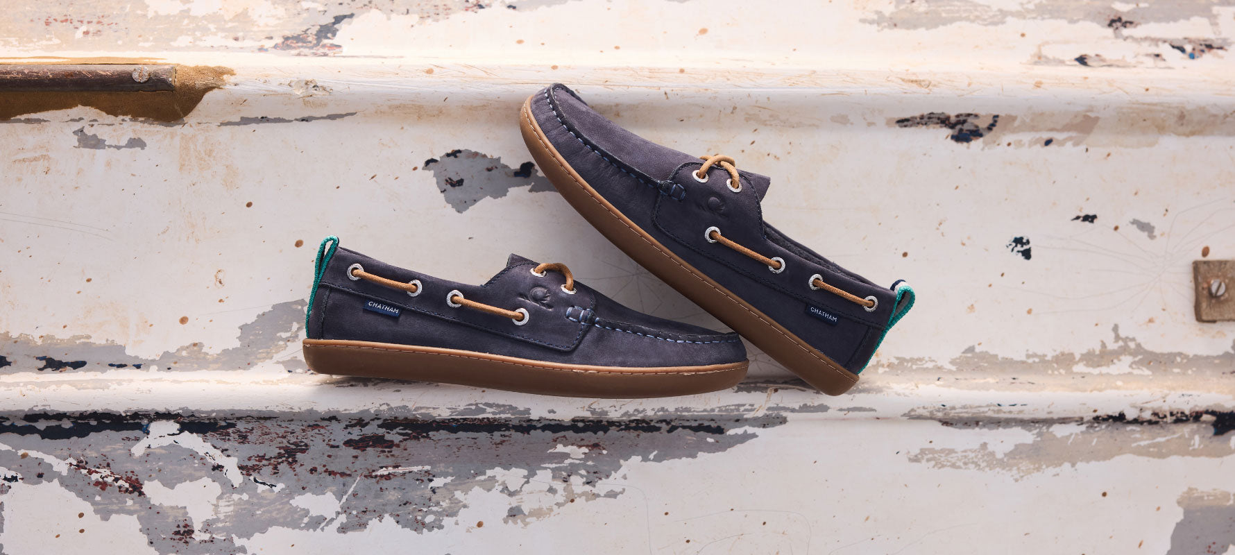 Catham Deck Shoes on coloured background