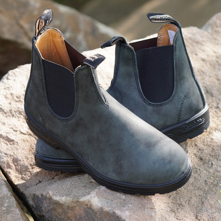 Blundstone Chelsea boots on a stone surface