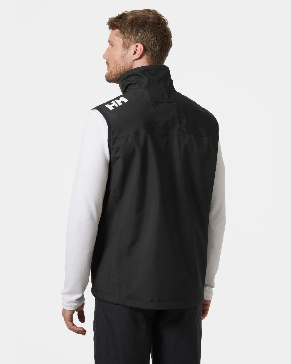 Black coloured Helly Hansen Mens Crew Sailing Vest 2.0 on grey background 