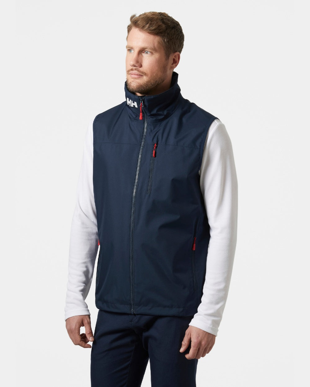 Navy coloured Helly Hansen Mens Crew Sailing Vest 2.0 on grey background 