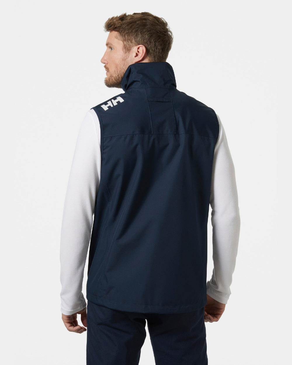 Navy coloured Helly Hansen Mens Crew Sailing Vest 2.0 on grey background 