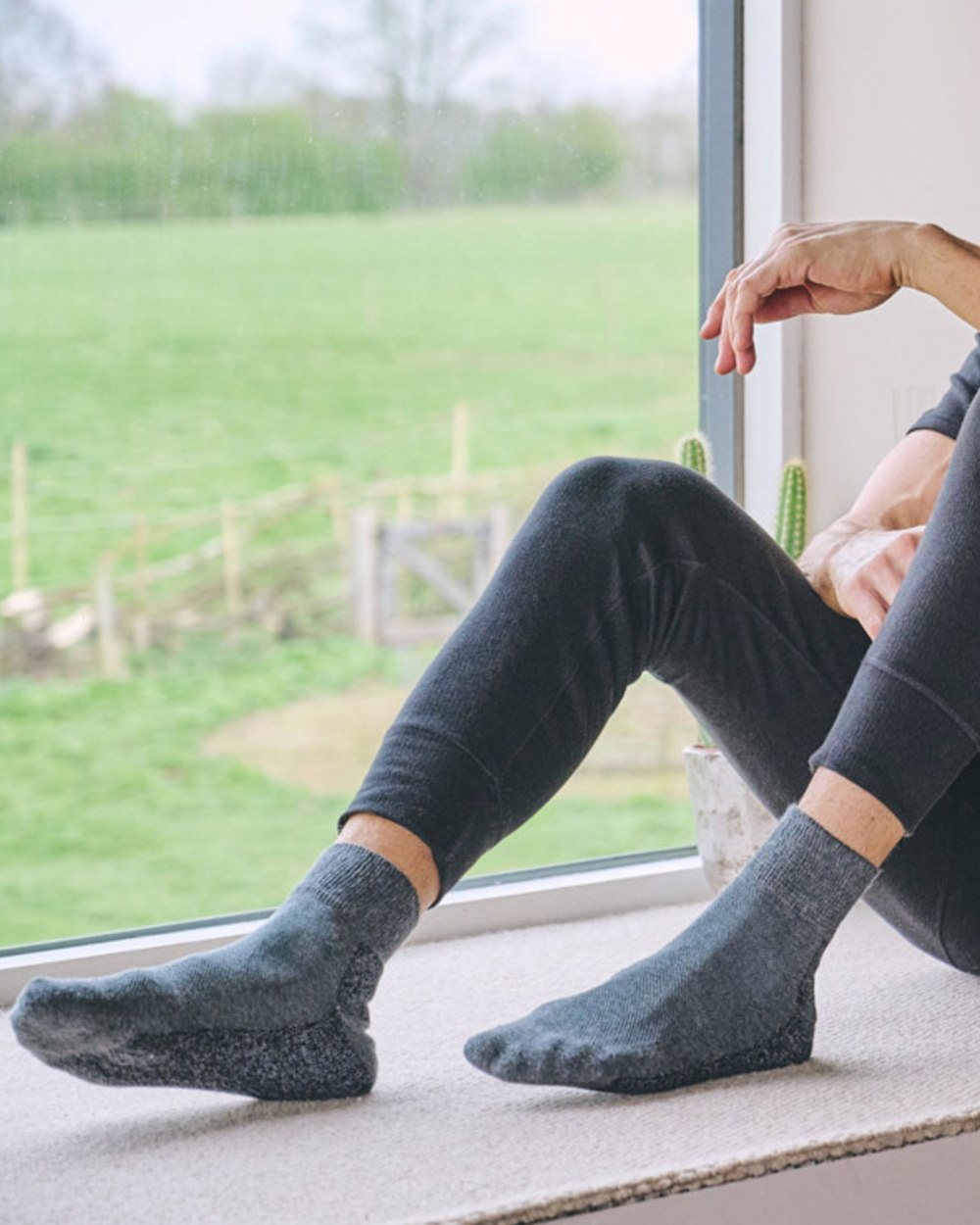 Grey coloured HJ Hall Diabetic Low Rise Cotton Socks on indoor background 