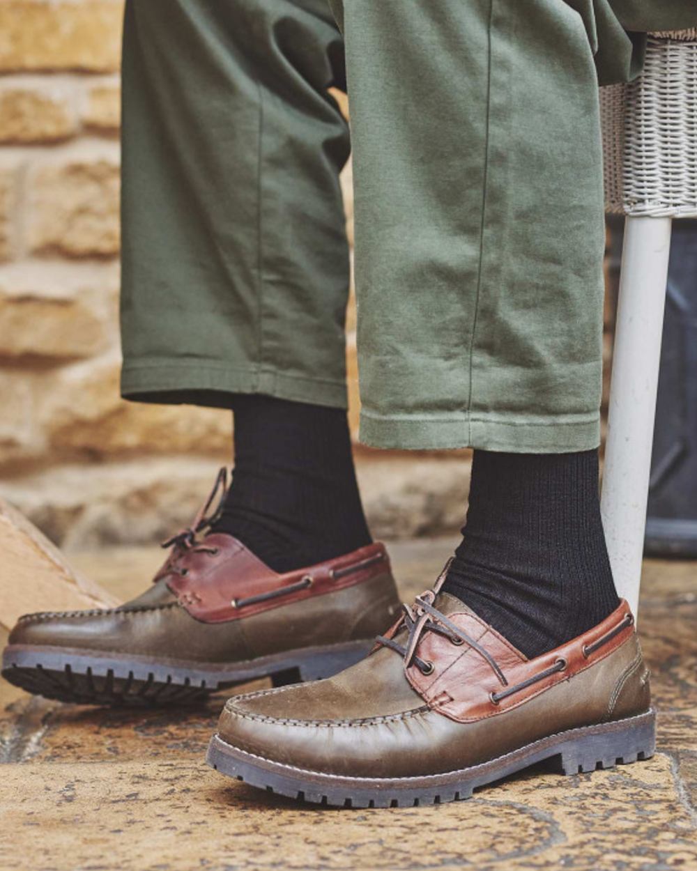 Black coloured HJ Hall Extra Wide Soft Top Sock Sanitised Wool on outdoor background 