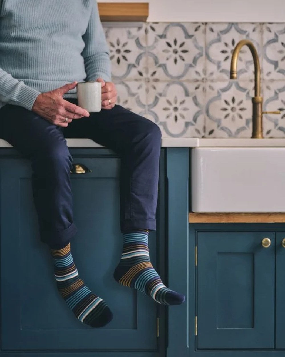 Navy coloured HJ Hall Graduated Stripe Comfort Top Socks on indoor background 