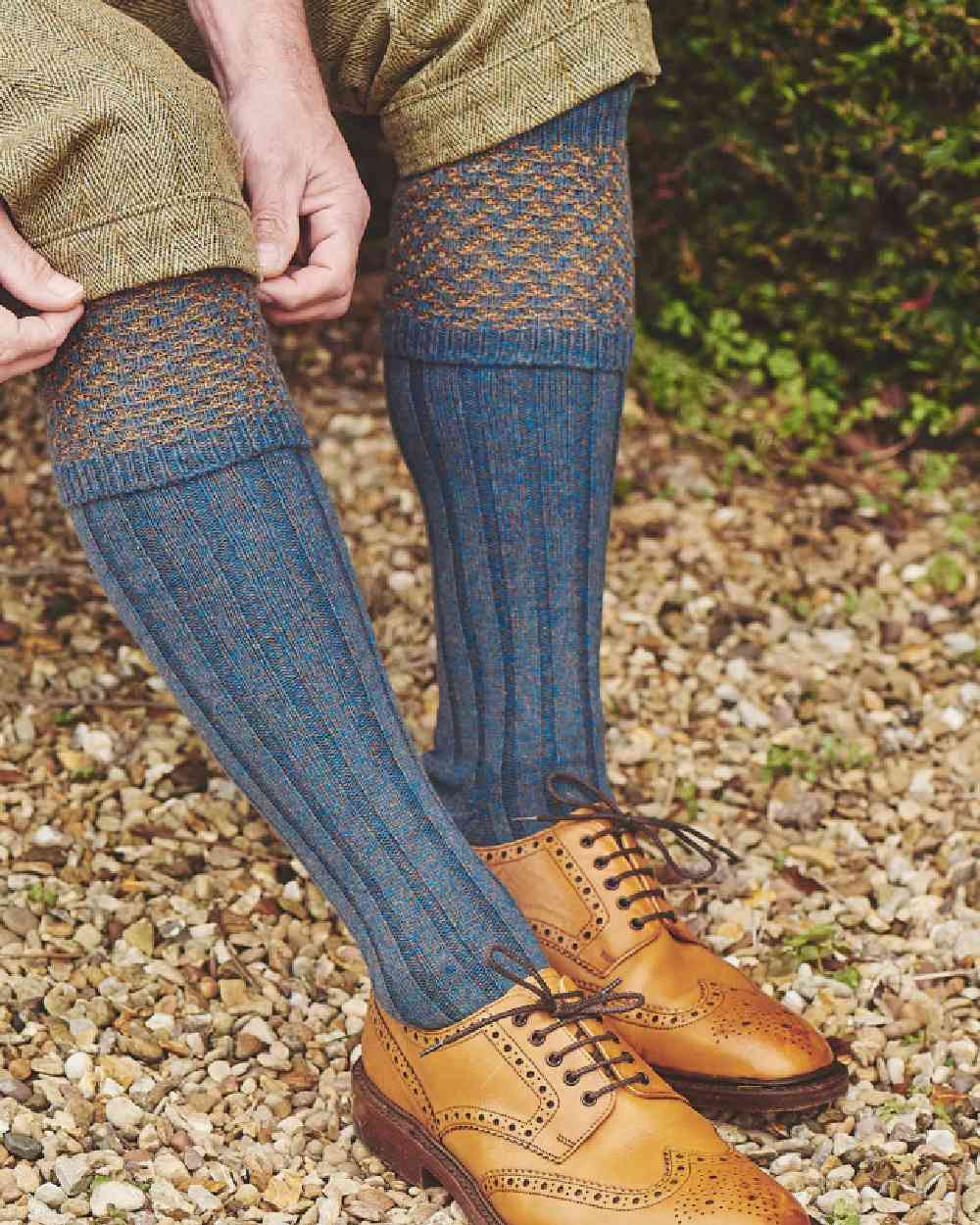 Petrol Marl coloured HJ Hall Hatfield Shooting Sock Textured Top on field background 