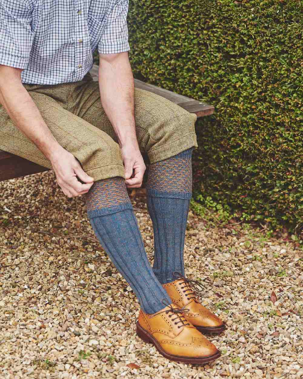 Petrol Marl coloured HJ Hall Hatfield Shooting Sock Textured Top on field background 