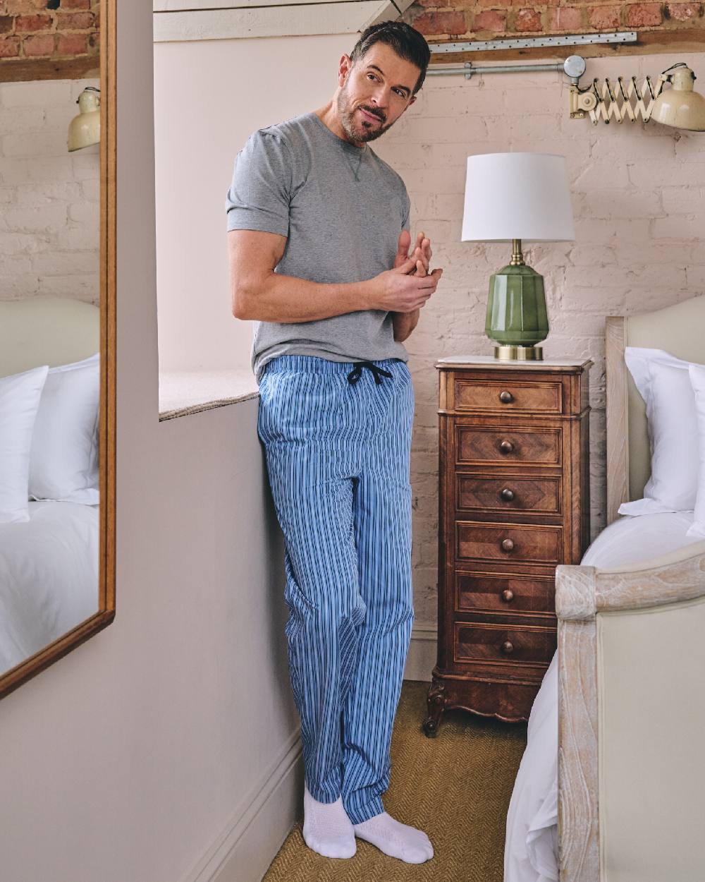 Grey Blue Coloured HJ Hall Mens Crew Neck T-Shirt And Long Pyjamas Set on indoor background 