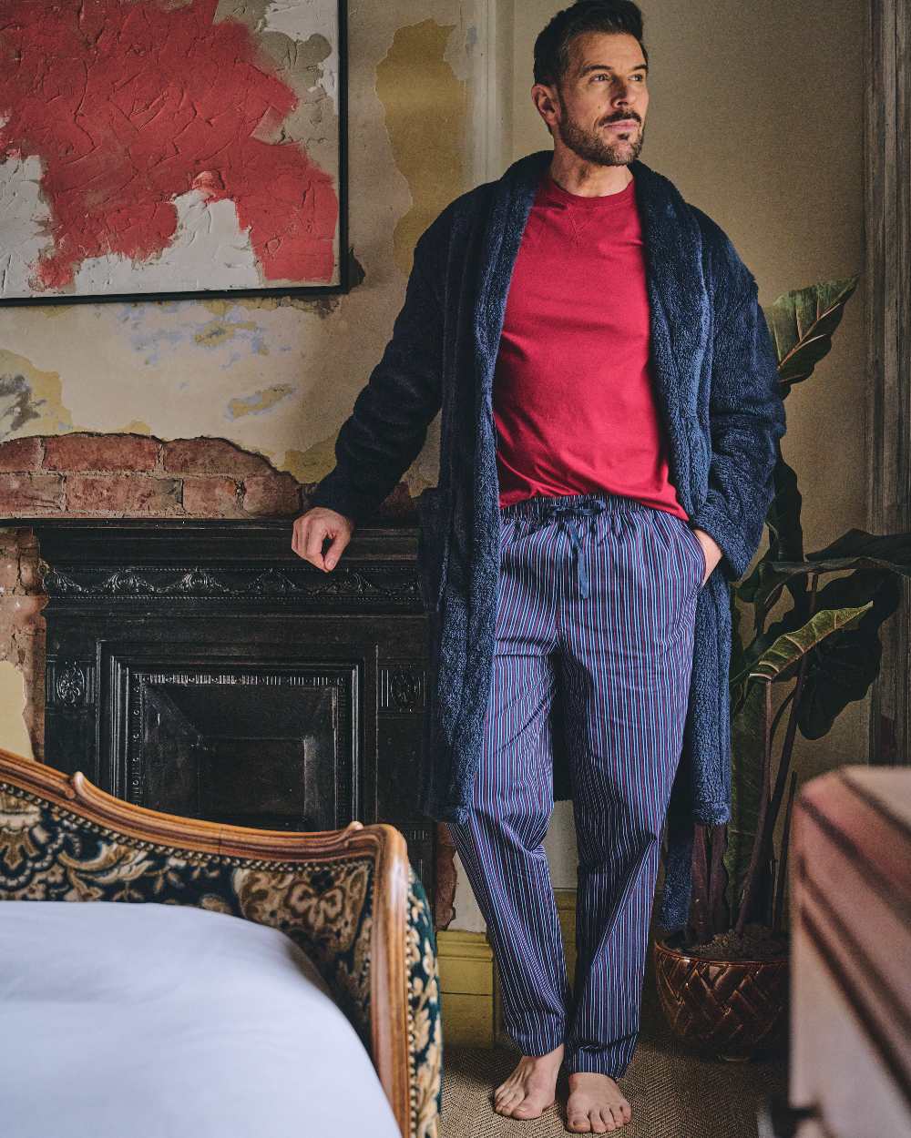 Red Navy Coloured HJ Hall Mens Crew Neck T-Shirt And Long Pyjamas Set on indoor background 