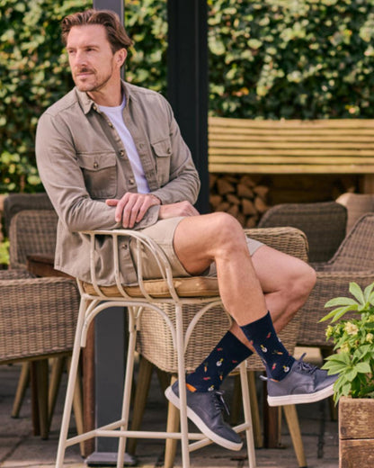 Navy Mix coloured HJ Hall Mens Garden Vegetables Motif Cotton Rich Socks 3 Pair Pack on outdoor background 