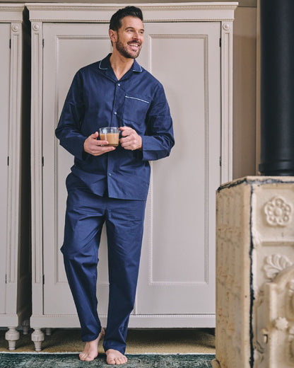 Dark Blue Coloured HJ Hall Mens Pure Cotton Pyjamas on indoor background 