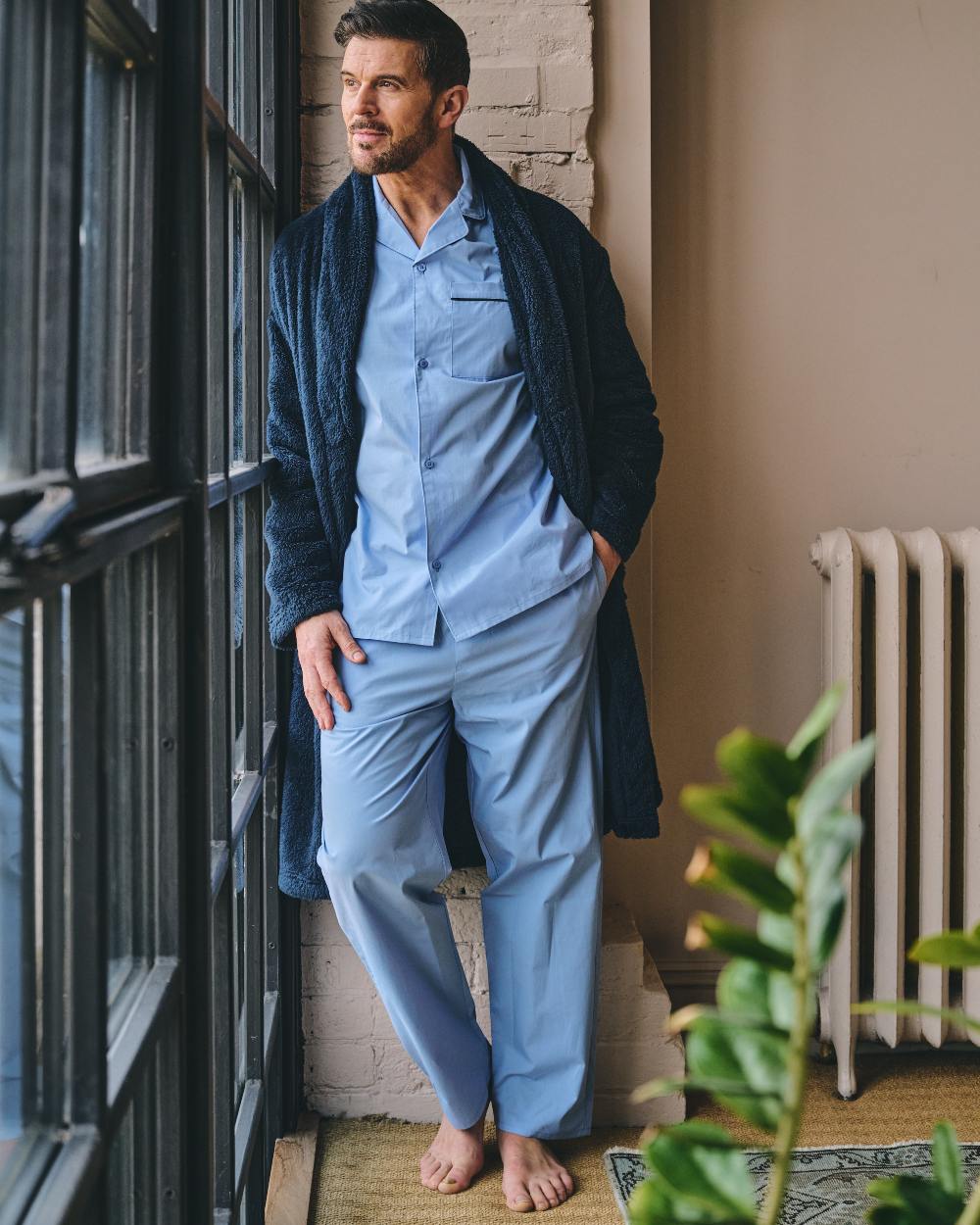 Light Blue Coloured HJ Hall Mens Pure Cotton Pyjamas on indoor background 