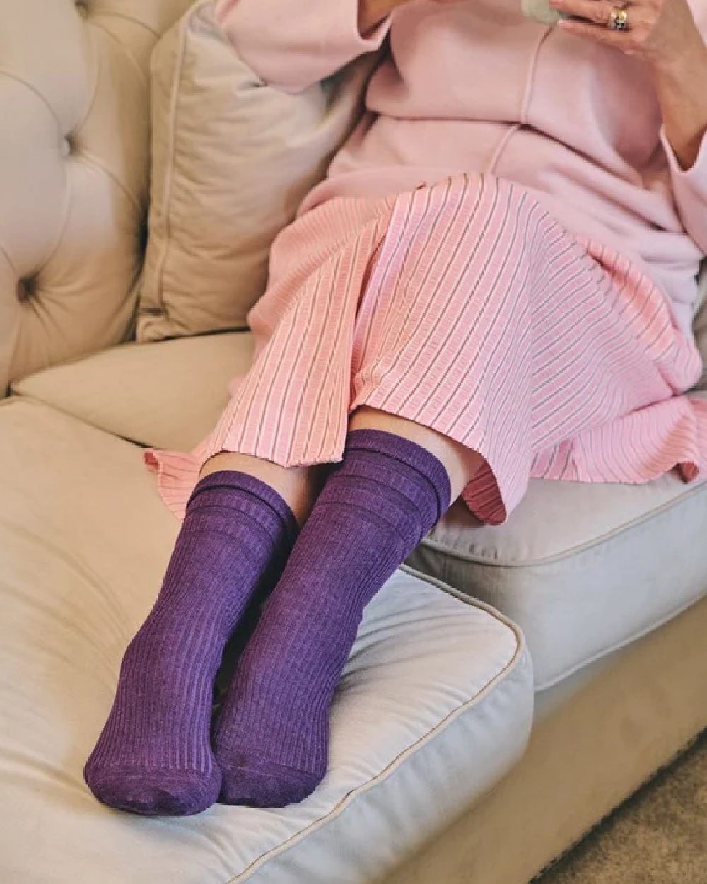 Aubergine coloured HJ Hall Original Cotton Soft Top Socks on indoor background 