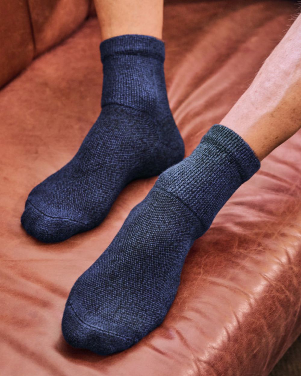 Navy coloured HJ Hall Temperature Comfort Coolmax Fibre Bamboo Socks on house background 