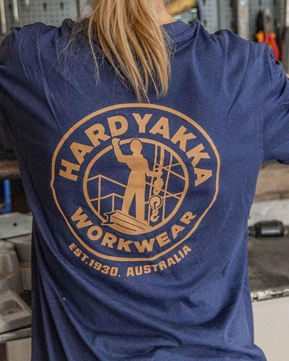 Navy coloured Hard Yakka Heritage Icon T-Shirt on outdoor background 