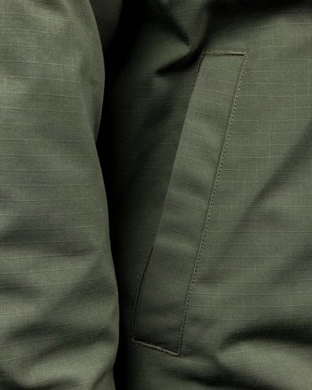 Military Green coloured Hard Yakka Mens Quilted Solid Shacket on white background 