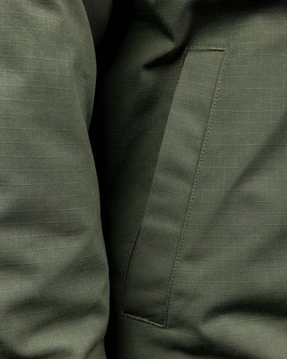 Military Green coloured Hard Yakka Mens Quilted Solid Shacket on white background 